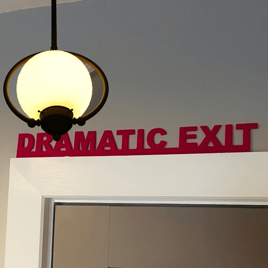 Dramatic Exit Art Deco Iron Wall Sculpture