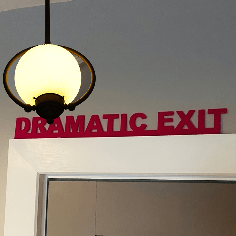 Dramatic Exit Art Deco Iron Wall Sculpture